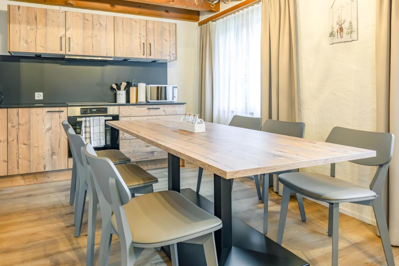 Apartment Eiger - Aare Jungfrau Ag Grindelwald Eksteriør bilde